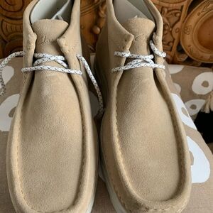 Clarks Tan Suede Chukka Boots with Minimalist Design